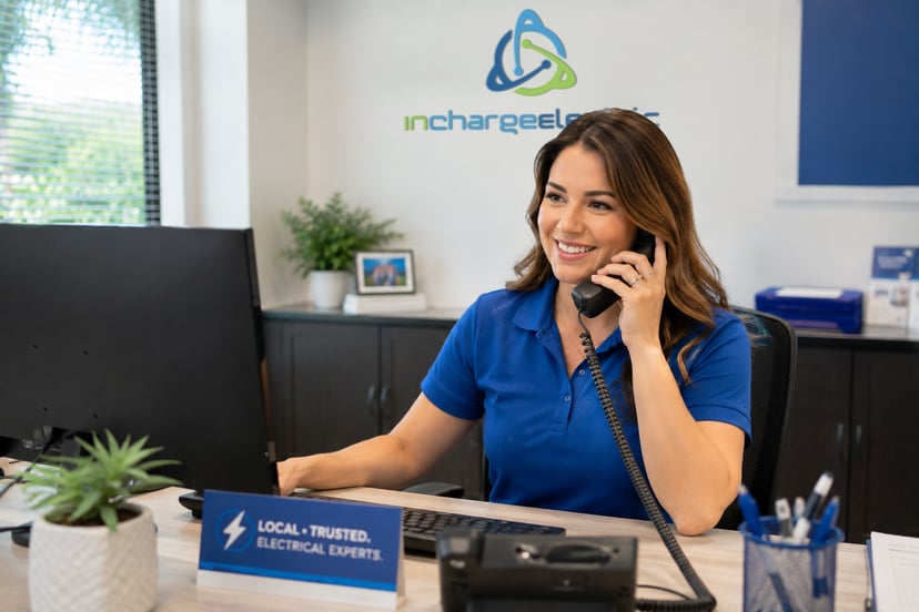 Friendly office staff member answering the phone